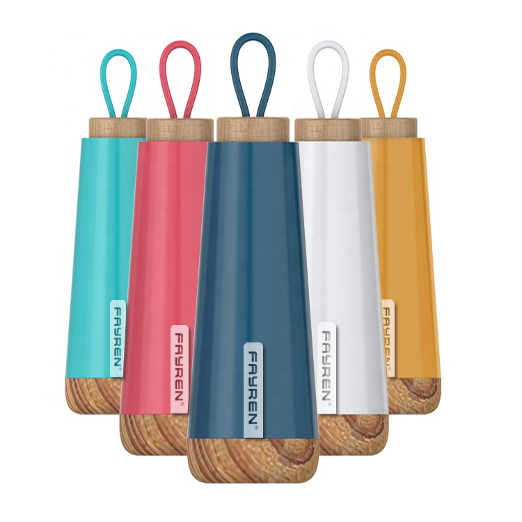 Sports bottle with bamboo lid