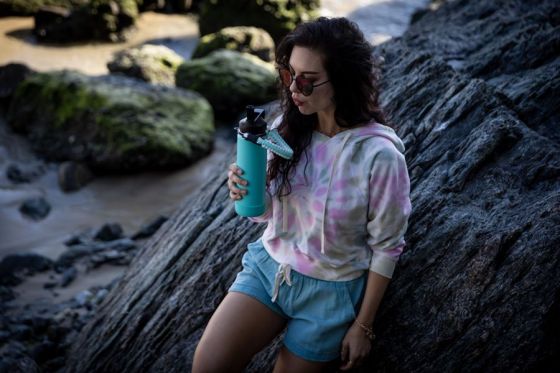 How often should we clean my stainless steel bottle to avoid a metallic taste?