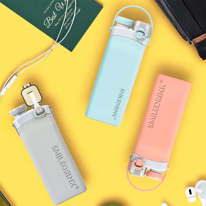 smiledrink Unbreakable foldable Silicone drinkware custom folding collapsible Silicone drink sport water bottle with Straw