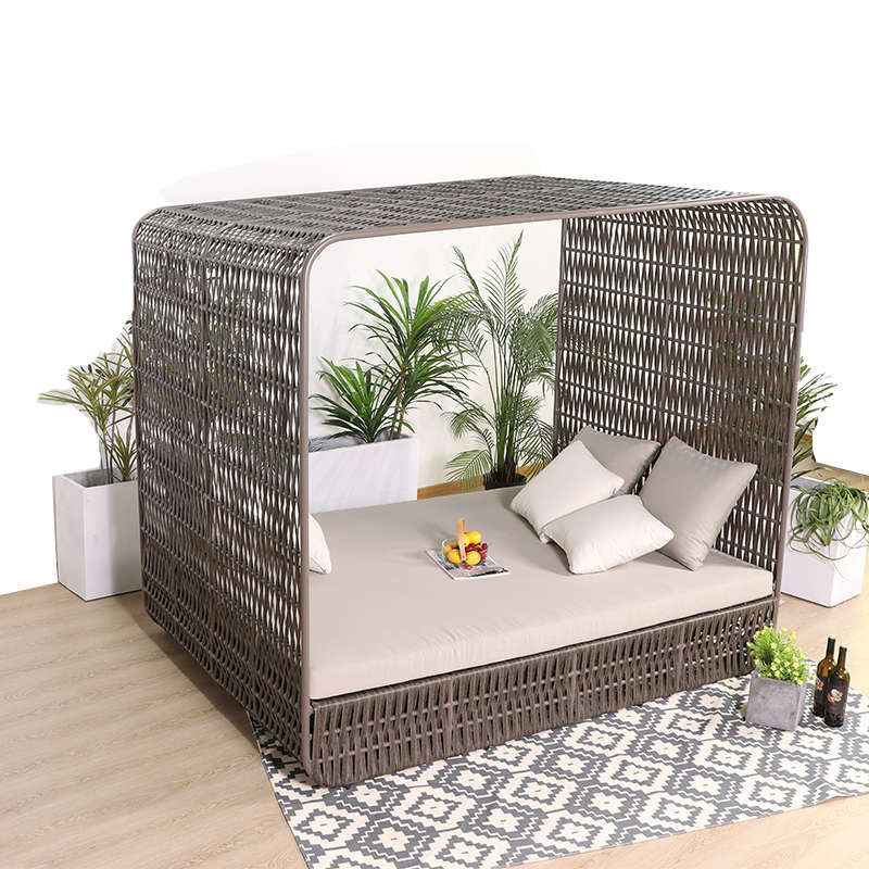 Wicker Outdoor Day Bed with Beige Cushions