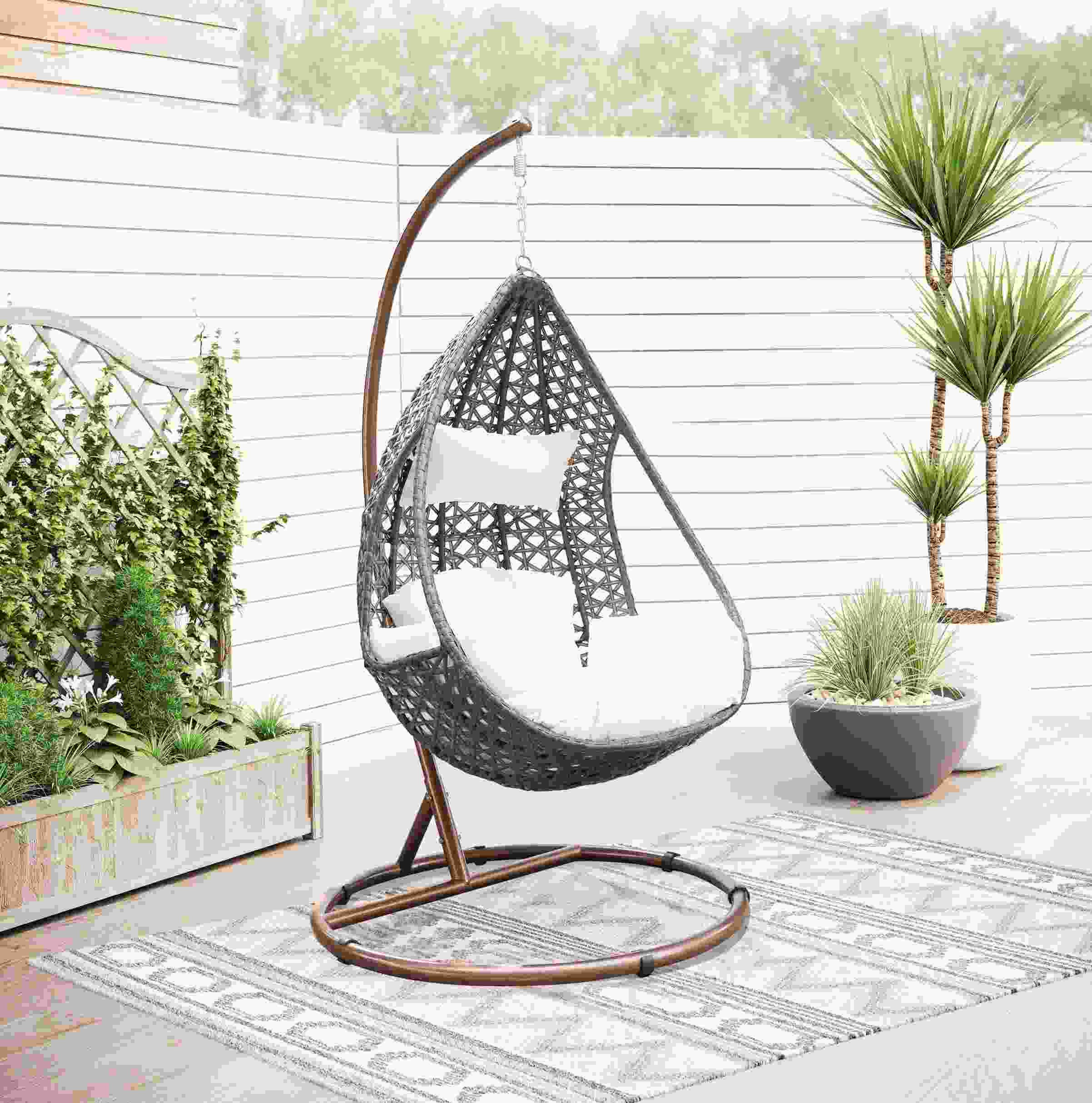 woven rattan outdoor hanging with basket