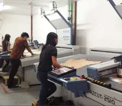 Automated furniture cutting machine.