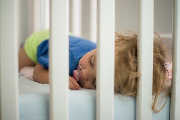 Baby sleeping in playpen best sale