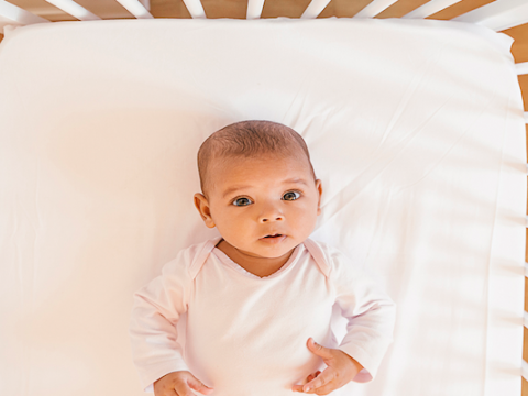 What is a bedside crib?