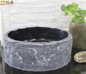 Fregadero de piedra caliza negra