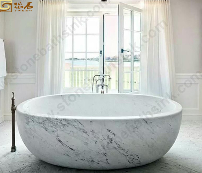 Banheira grande redonda em mármore branco Bianco Carrara