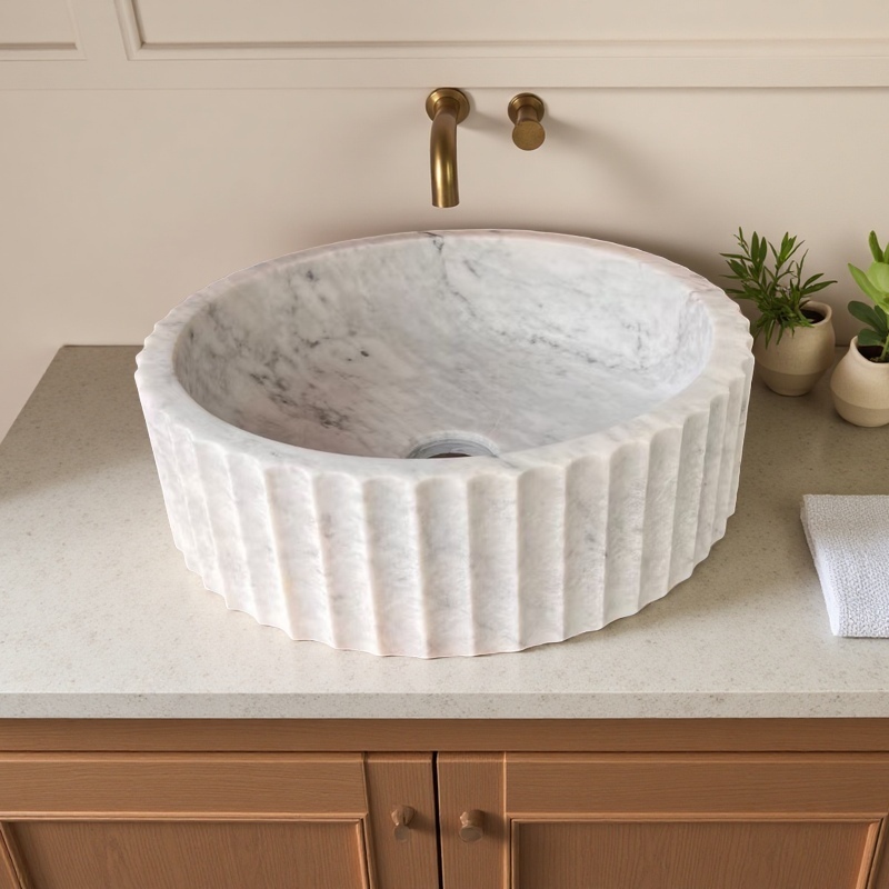 The Allure of Marble Washbasins and Unique Vessel Sinks