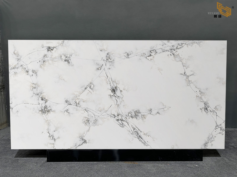 Soft White Calacatta Quartz Surface with Natural Branching Grey Veins