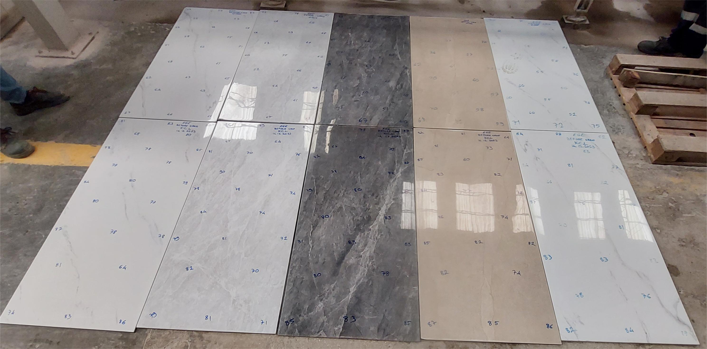 Display of various glaze tile polishing effects after customers used KCL abrasive