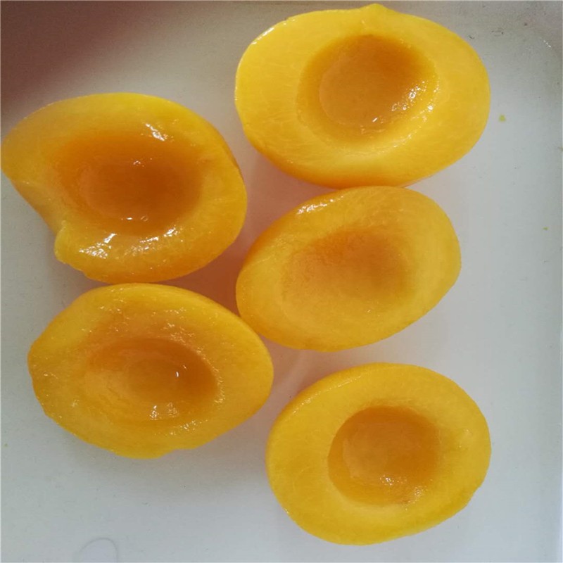 Консервированные желтые персики половинки в легком сиропе