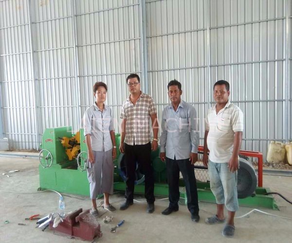 Our technicians help Cambodia customer to install and debug mesh welding machine