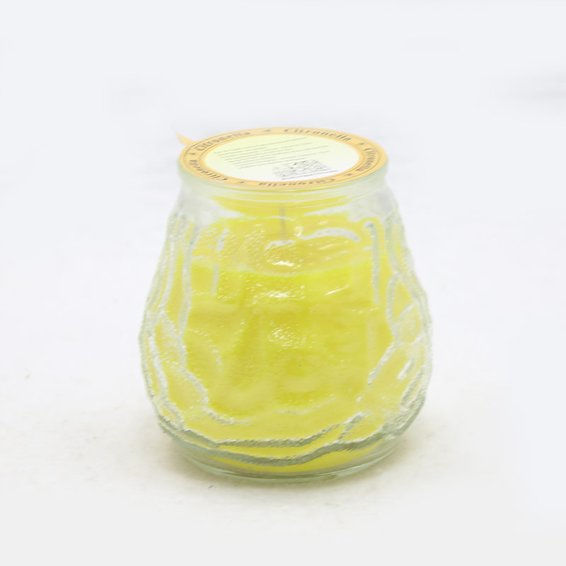 Candela in vaso di vetro citronella giallo zanzara