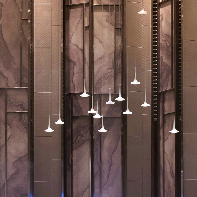 Hotel long hallway chandeliers