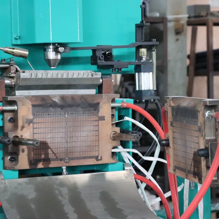 Máquina de fundición de rejilla de batería de plomo
