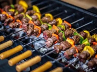Which is more advantageous, charcoal grill or gas oven?