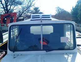 Battery powered air conditioner for trucks