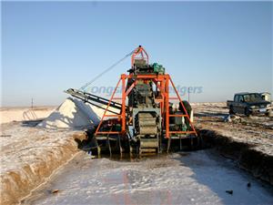 Self Propelled Salt Mining Boat In Lake Water And On Land