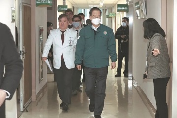 S. Korean hospitals under strain as doctors' strike widens