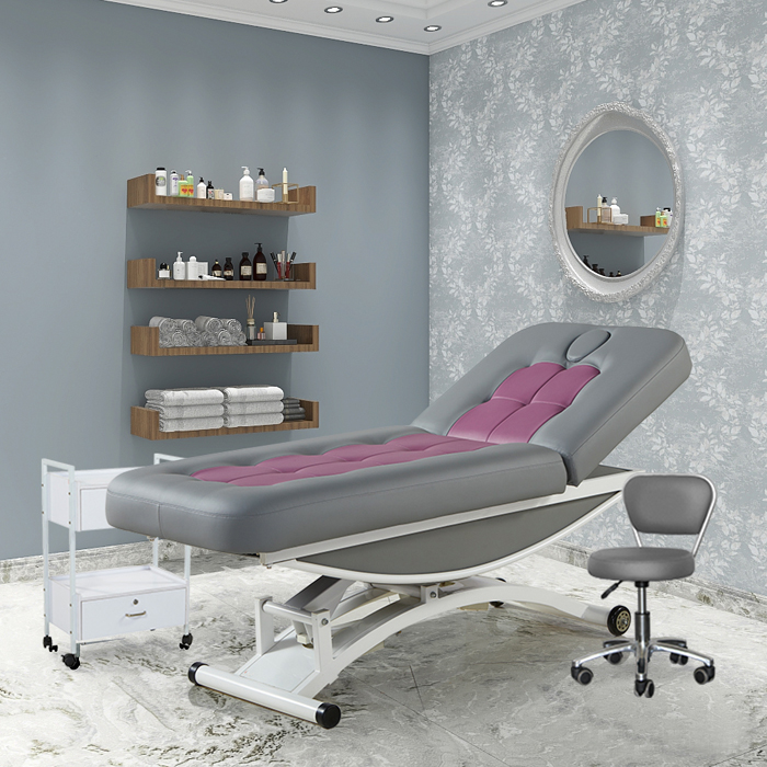 Розкішне сіре мобільне масажне ліжко для обличчя з косметикою для обличчя