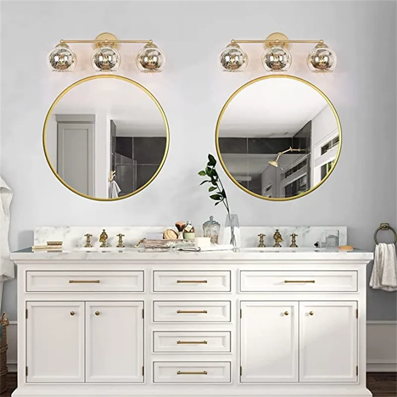 What is the optimal height of bathroom vanity light fixtures?