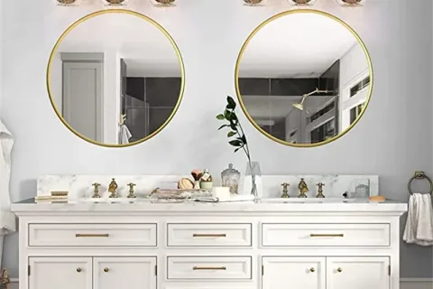What is the optimal height of bathroom vanity light fixtures?
