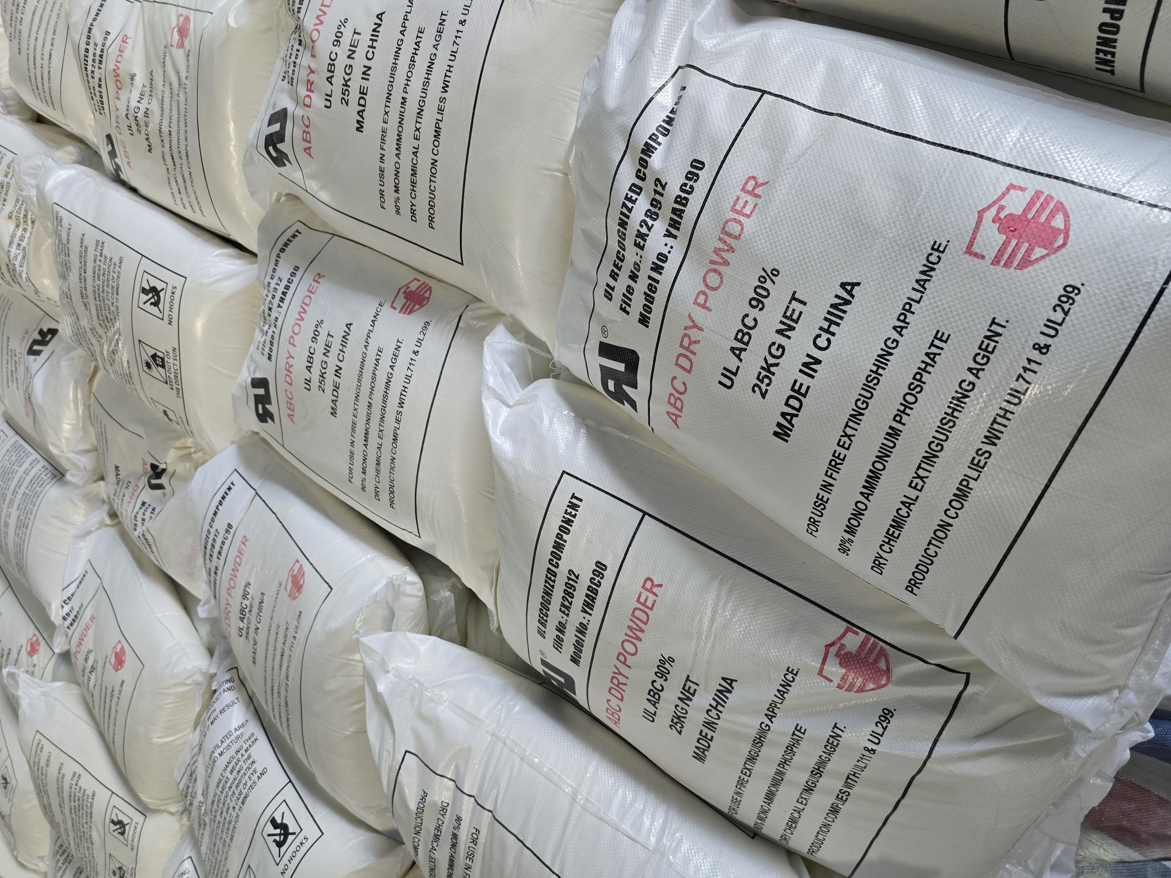 Can ABC Dry Chemical Powder be mixed with other fire extinguishing agents?