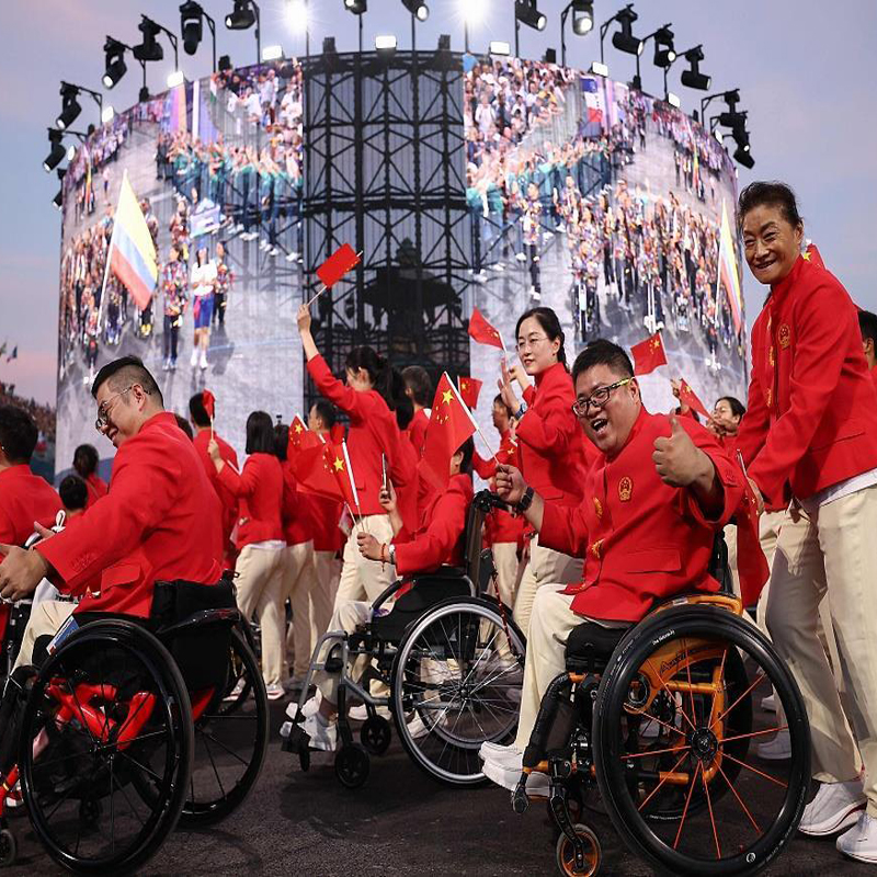 A range of red in the east cheer for the 2024 Paralympic Games