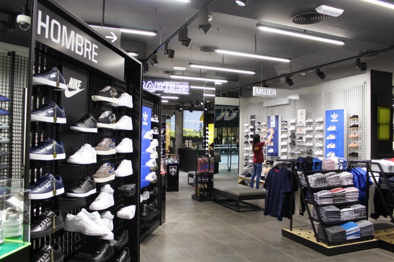 Синтоп Отображать приспособление представляет передовые инновации в области ПОП-дисплеев