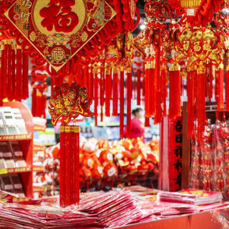 กิจกรรมเทศกาลตรุษจีนของครอบครัวชาวจีนและแนวโน้มของชั้นวางสินค้า