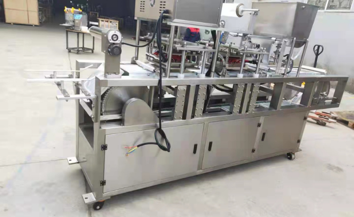 Bean curd filling and sealing machine