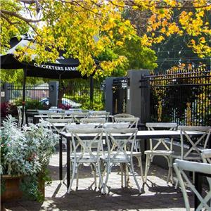 Classic Vintage Colourful Cross Back Chairs And Table Set Used For The Stirling Arms Hotel