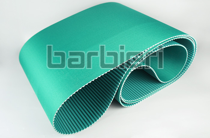 Timing belt tooth and back with polyamide fabric