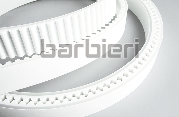 Timing belt with polyamide fabric