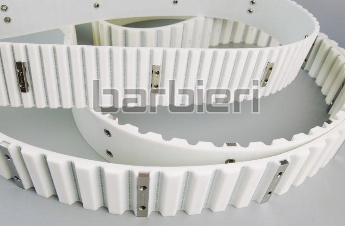 Timing belt with fixtures