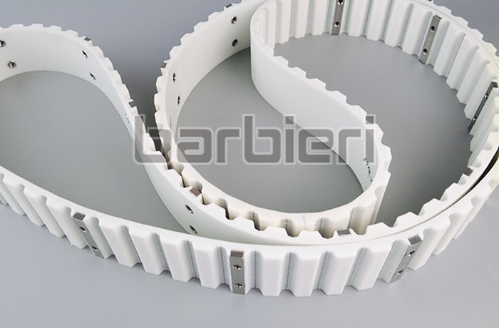 Timing belt with false teeth