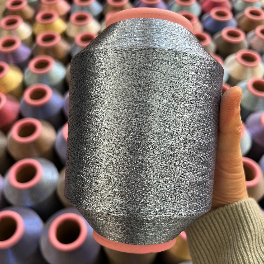 Китай Высококачественный тип MH поток пряжи яркого блеска чистого цвета полиэстера металлический для соткать, производитель