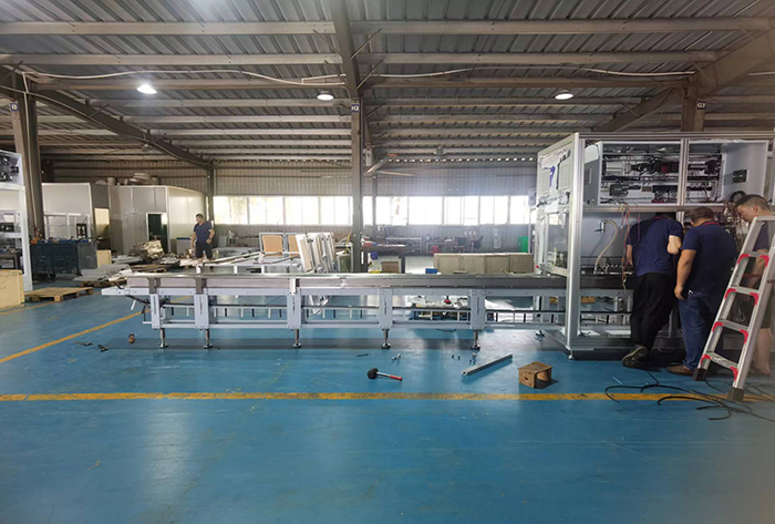 산다국제포장용 생리대 포장기 개발중