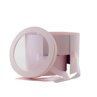 στρογγυλά φανταχτερά μεγάλα χάρτινα κουτιά με κορδέλα δώρου