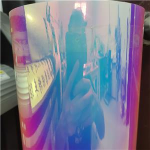 Holografisches leuchtendes Regenbogen-Glühen im dunklen Vinyl