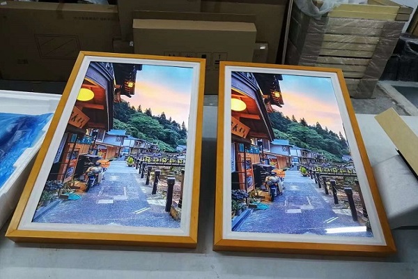 Vantaggi della macchina pubblicitaria con cornice per foto