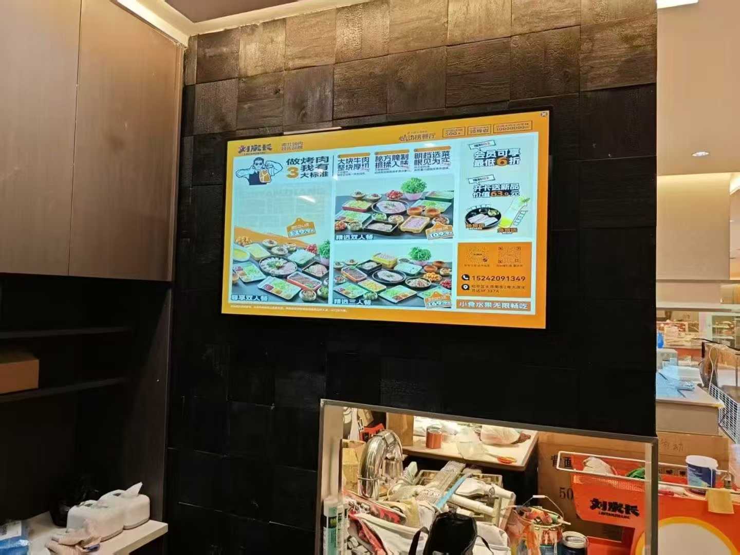 Wall-mounted advertising displays