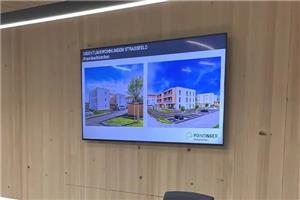Cum am ajutat un lanț de magazine din Marea Britanie să reducă timpii de așteptare ai clienților cu ajutorul panourilor de anunțuri digitale