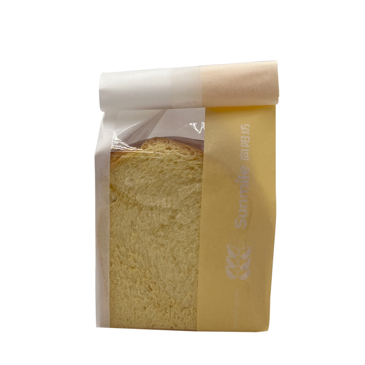 창문이 있는 크래프트 종이 봉지 틴 타이의 빵