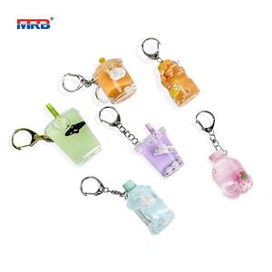 Cute and Creative Liquid Floating Milk Tea Cup Unicorn Lucky Bottle KeyChain KeyRing CarKey Bag Pendant Couple Style