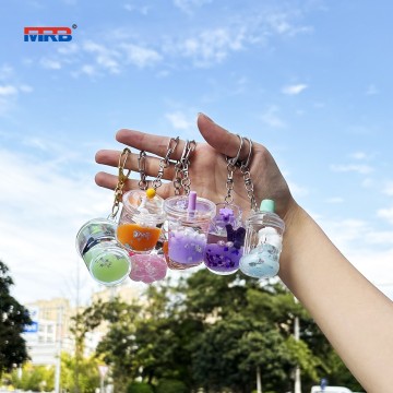 Wholesale Creative Acrylic Keychain Oil Into Bottle Floating Bubble Beads Drifting Key Chain Liquid Keychain