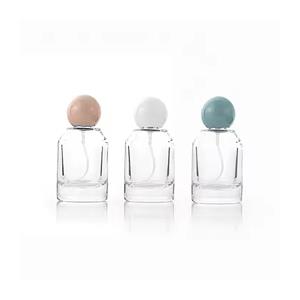 High-Grade Luxury Perfume Bottle Resin Cap Custom Design with Red Green Black White Marble Ball Fancy Resin Crafts