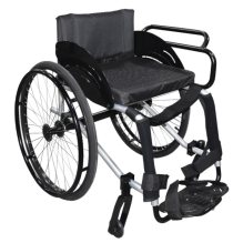 Why are wheelchairs designed to be high in the front and low in the back?