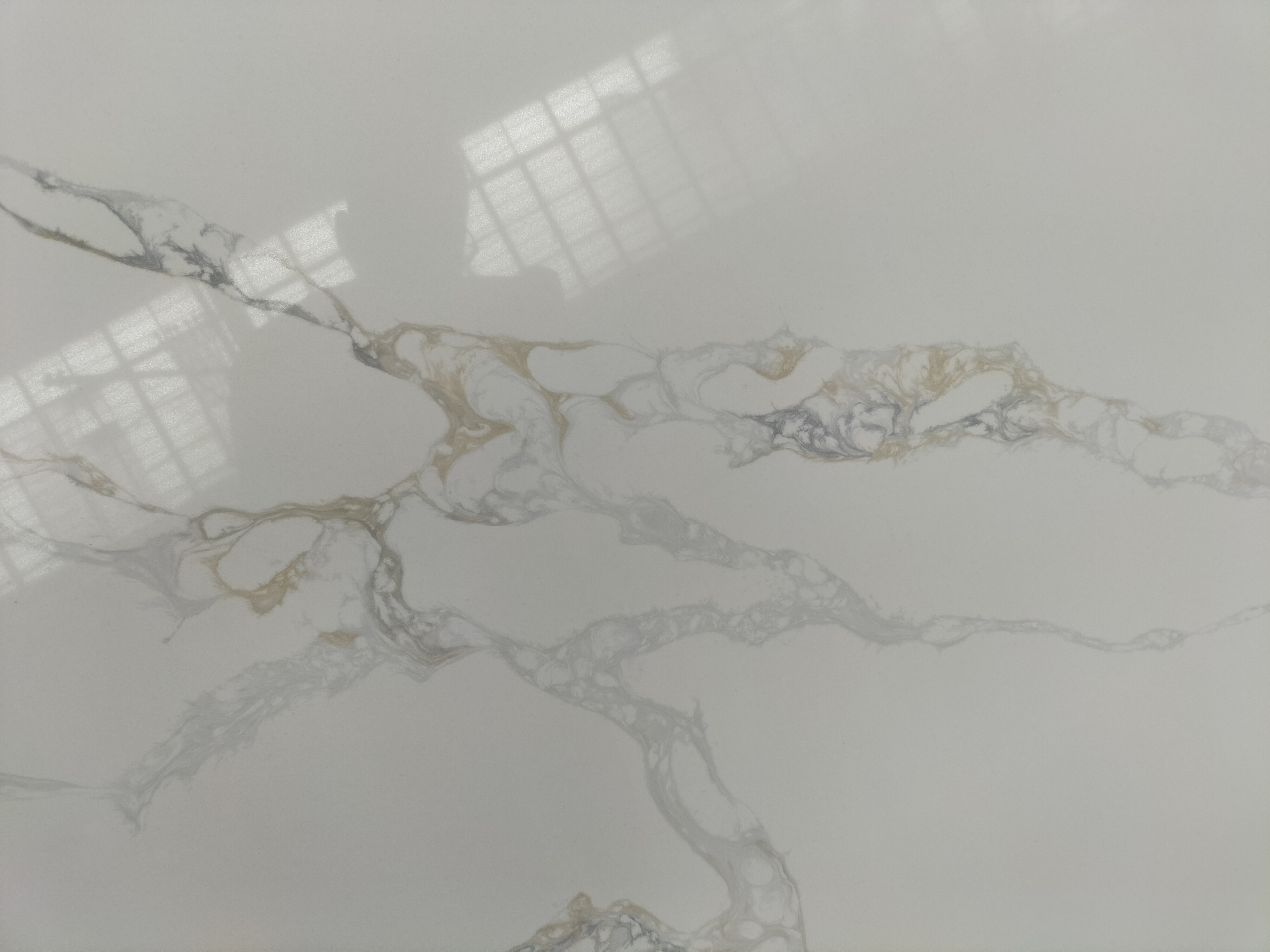 Golden Veins Calacatta Quartz Slab