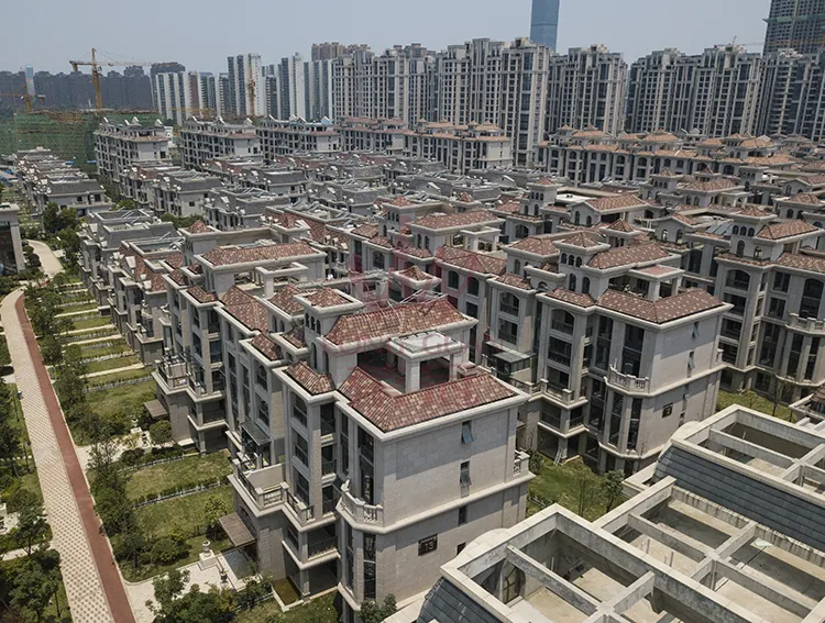 What needs to be laid underneath when installing Spanish clay roof tiles?