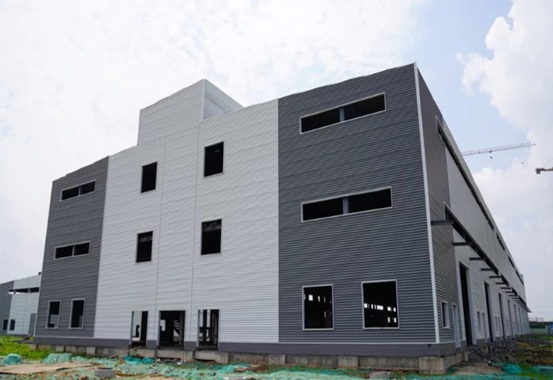 Job site visit. We are proud to stand next to the building we fabricated and erected